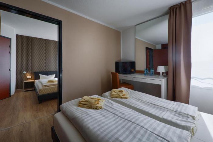 Regiohotel Leipzig West Шкойдиц Стая снимка